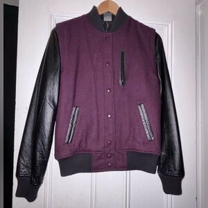 This is a Nike women’s varsity jacket size Small. Barely worn